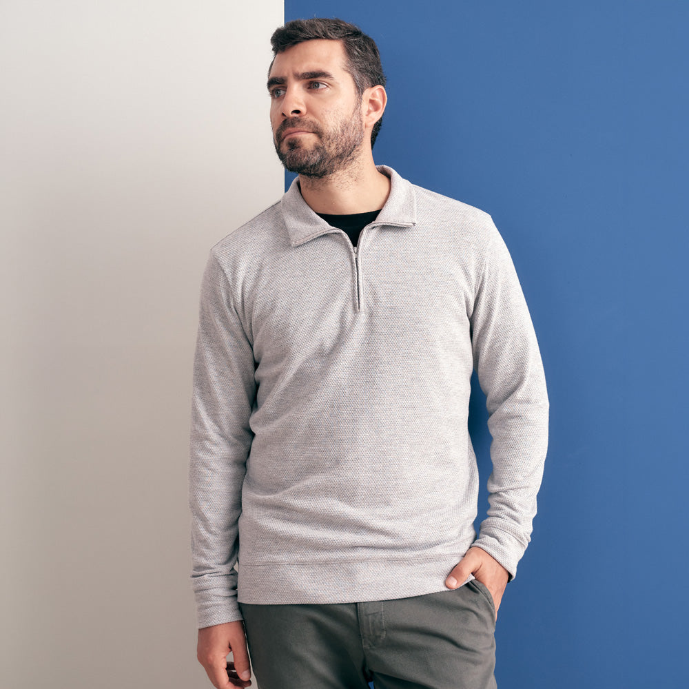 POLO DE PUNTO CUELLO ALTO CON CIERRE GRIS